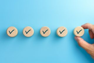 Hand making ticks marks